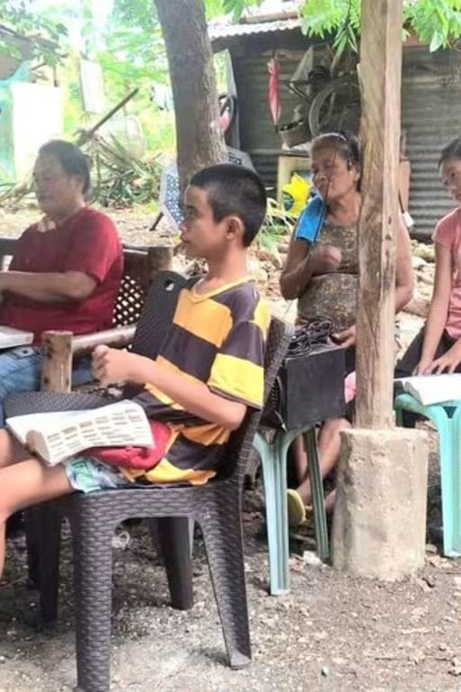All ages were able to hear the Word. We were able to purchase and hand out some bibles while we were there. This young man has his hands full using my ESV study bible. 