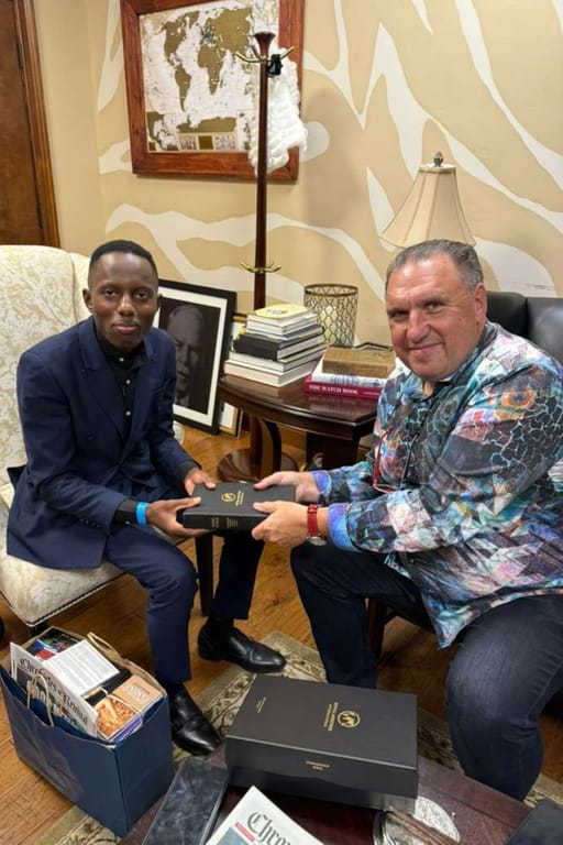 Receiving counsel from Dr. Rodney Howard‑Brown, a moment of impartation and guidance for global missions
