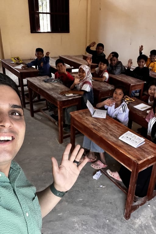 Eric teaching english at a local school.