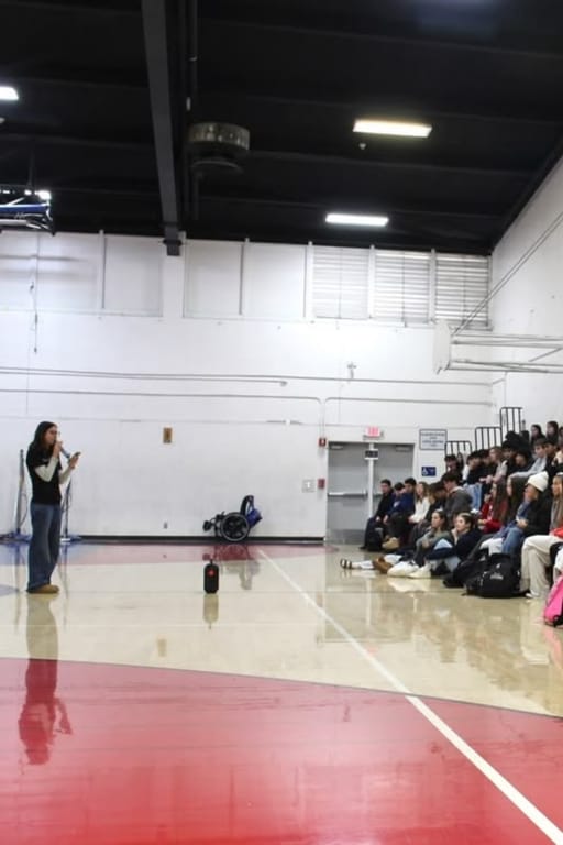 This is me serving as my high school's F.A.I.T.H. Club president during my senior year!